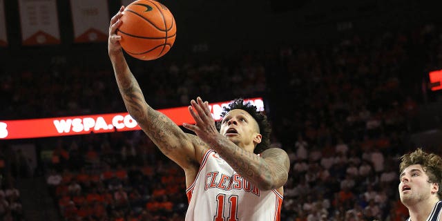 Clemson Tigers guard Brevin Galloway (11) shoots an uncontested layup during a game against the Duke Blue Devils Jan. 14, 2023, at Littlejohn Coliseum in Clemson, S.C.