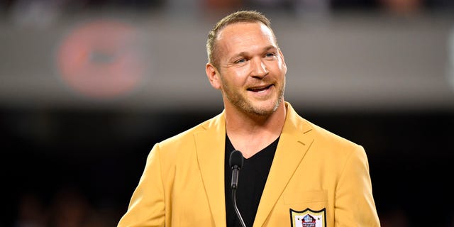 Brian Urlacher is honored with a Ring of Excellence ceremony for his recent Hall of Fame induction at Soldier Field on September 17, 2018 in Chicago, Illinois.