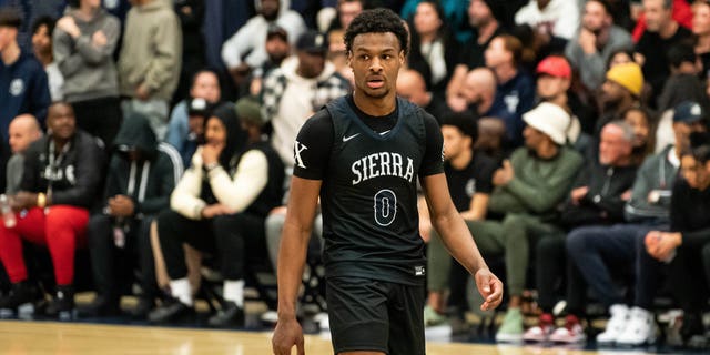 Bronny James looks on during the Sierra Canyon vs Christ The King boys basketball game at Sierra Canyon High School on December 12, 2022 in Chatsworth, California.