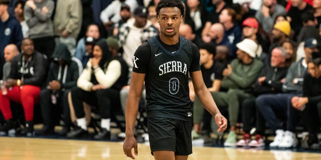 Bronny James looks on during the Sierra Canyon vs Christ The King boys basketball game at Sierra Canyon High School on December 12, 2022 in Chatsworth, California.