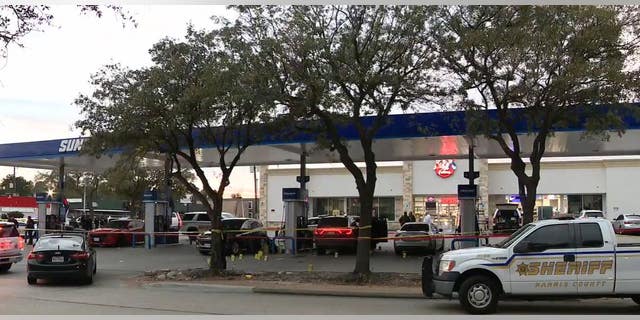 Two men were killed when at least three shooters fired 50 to 70 shots into their vehicle at a Houston-area gas pump.