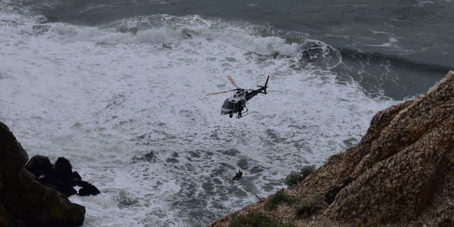 The two minors were unharmed, officials said.