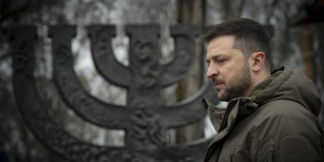 Ukrainian President Volodymyr Zelenskyy attends the ceremony at the Menorah memorial at the Babyn Yar National Historical and Memorial Reserve in honor of Holocaust Memorial Day Jan. 27, 2023.