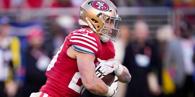 Christian McCaffrey #23 of the San Francisco 49ers carries the ball against the Dallas Cowboys during the first quarter of the NFC Divisional Playoff game at Levi's Stadium on January 22, 2023 in Santa Clara, California.