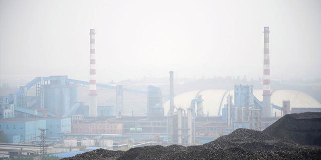 Dunes of low-grade coal are seen near a mine in China on Nov. 4, 2021. 
