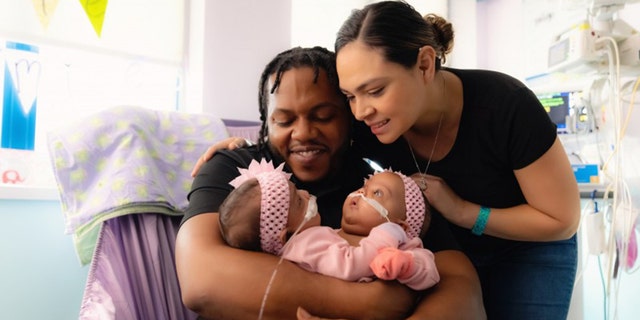 James Finley (left) and Amanda Arciniega (right) are parents to AmieLynn Rose and JamieLynn Rae Finley.