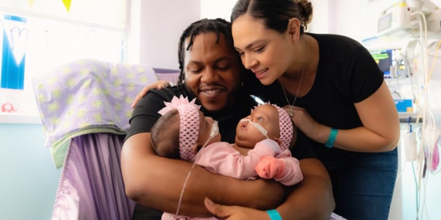 James Finley (left) and Amanda Arciniega (right) are parents to AmieLynn Rose and JamieLynn Rae Finley.