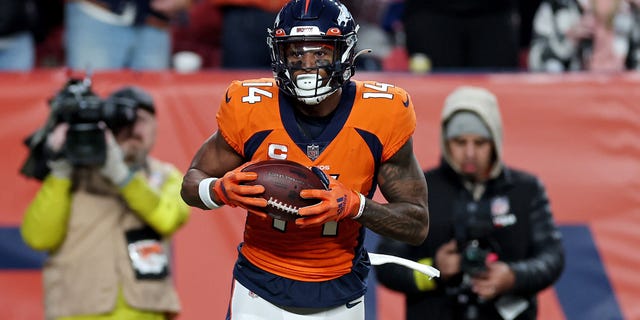 The Broncos' Courtland Sutton catches a touchdown pass against the Los Angeles Chargers at Empower Field At Mile High on January 8, 2023 in Denver.