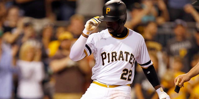 Andrew McCutchen of the Pittsburgh Pirates reacts after hitting a solo home run in the seventh inning during a game against the Milwaukee Brewers at PNC Park on September 3, 2016, in Pittsburgh.  