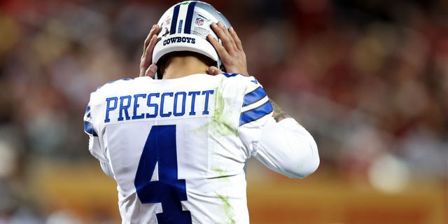 Dak Prescott #4 of the Dallas Cowboys reacts during the second half of the game against the San Francisco 49ers in an NFC Divisional Playoff game at Levi's Stadium on January 22, 2023 in Santa Clara, California.