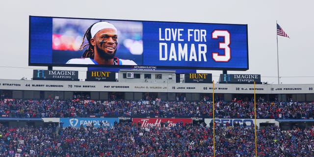 The scoreboard displays a message of support for Damar Hamlin during the New England Patriots and Buffalo Bills game at Highmark Stadium on January 8, 2023 in Orchard Park, New York.