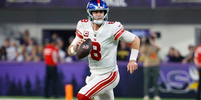 Daniel Jones of the New York Giants looks to pass against the Minnesota Vikings during the first half in an NFC wild-card playoff game at U.S. Bank Stadium Jan. 15, 2023, in Minneapolis.