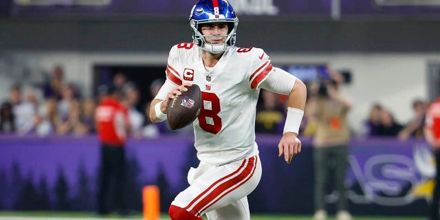 Daniel Jones of the New York Giants looks to pass against the Minnesota Vikings during the first half in an NFC wild-card playoff game at U.S. Bank Stadium Jan. 15, 2023, in Minneapolis. 