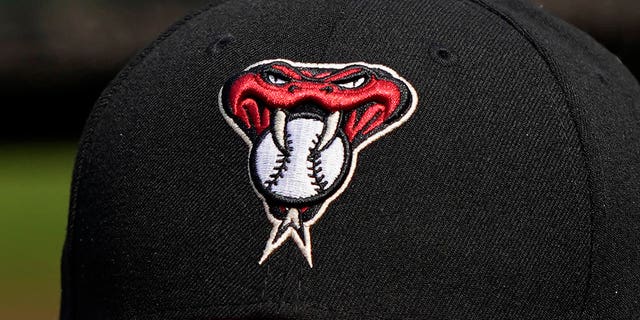 A detailed view of the Arizona Diamondbacks logo on a cap worn by a player before a game against the San Francisco Giants at Oracle Park in San Francisco on August 23, 2020.