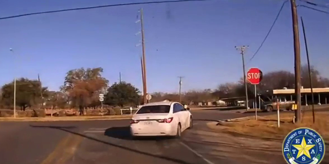 A local police department deployed a tire deflation device, which flattened the car's two front tires and brought the vehicle to a stop.