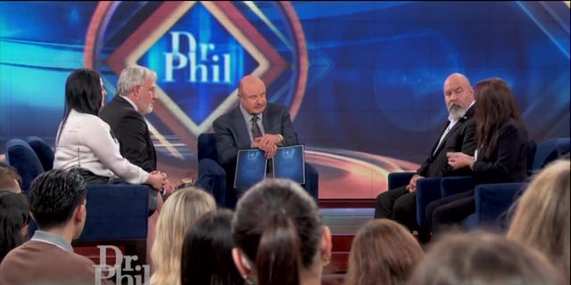 Dr. Phil speaks with his guests on an episode about the Idaho murder suspect.