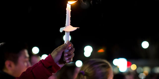 Residents of Newport News hold a candlelight vigil in honor of Richneck Elementary School first-grade teacher Abby Zwerner. Zwerner said in a new interview how grateful she was for the support.