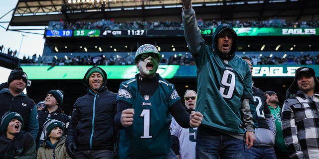 Philadelphia Eagles fans celebrate after a play during the second half of a game against the Tennessee Titans at Lincoln Financial Field Dec. 4, 2022, in Philadelphia. 