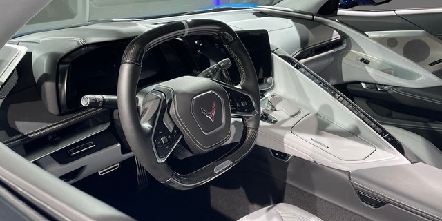 The E-Ray's interior is largely the same as it is in other Corvettes, but adds buttons for engine idle/stop and a Charge+ setting that maximizes the battery pack's charge for track driving.