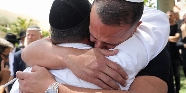 Relatives and friends mourn on May 6, 2022 during the funeral of Oren Ben Yiftach, a 35-year-old Israeli who was killed in a terror attack.