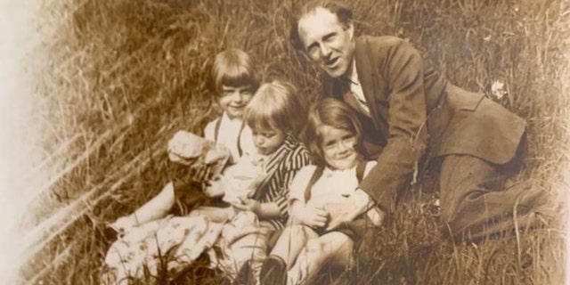George Bourlet and his children are shown in this picture from decades ago.