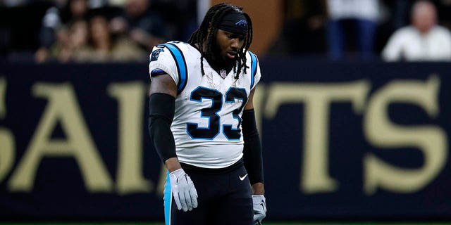 D'Onta Foreman (33) of the Carolina Panthers reacts after being disqualified during the third quarter against the New Orleans Saints at Caesars Superdome on January 8, 2023 in New Orleans. 