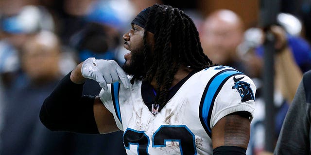 D'Onta Foreman of the Carolina Panthers reacts after being disqualified during the third quarter against the New Orleans Saints at Caesars Superdome Jan. 8, 2023, in New Orleans.