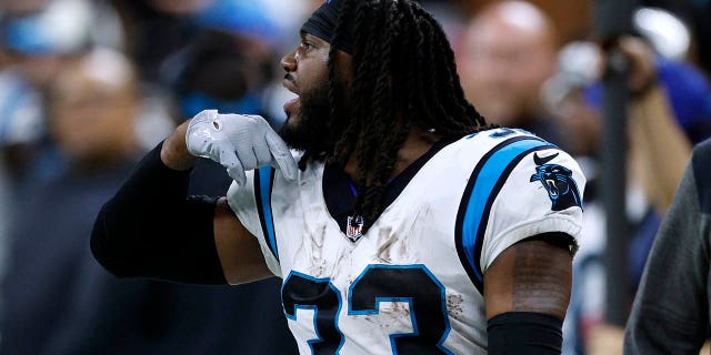 D'Onta Foreman of the Carolina Panthers reacts after being disqualified during the third quarter against the New Orleans Saints at Caesars Superdome Jan. 8, 2023, in New Orleans.