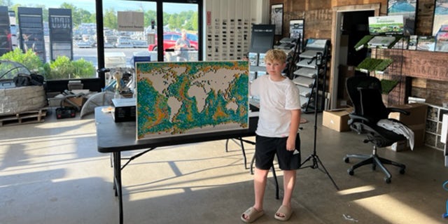 Cooper Wright was holds the current Guinness World Record for "fastest time to build the LEGO World Map."
