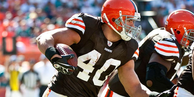 Cleveland Browns running back Peyton Hillis carries the ball against the Dolphins at Sun Life Stadium on December 5, 2010 in Miami, Florida.
