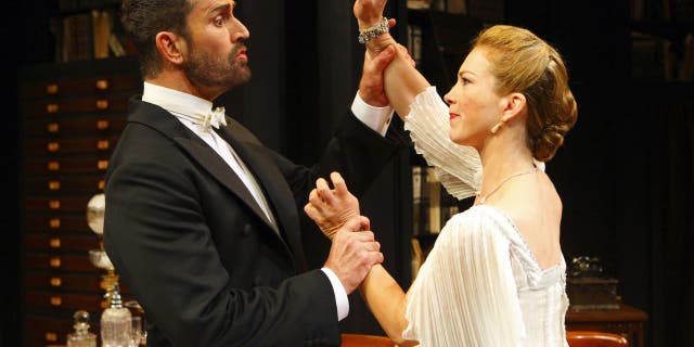 Rupert Everett (left) as Professor Henry Higgins and Honeysuckle Weeks as Liza Doolittle in George Bernard Shaw's Pygmalion at the Festival Theatre in Chichester, West Sussex.
