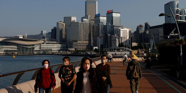 People wearing face masks in the streets of Hong Kong, China, on Dec. 28, 2022. 