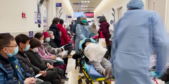 A hospital in Shanghai is seen overflowed with patients and health providers.