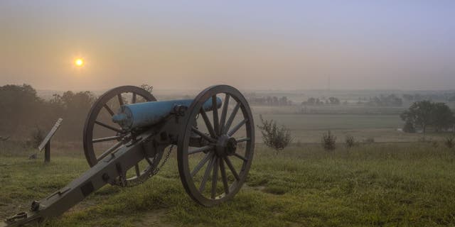 Dawn over the Gettysburg battlefield. In Pennsylvania, "it is a crime to serenade a wedding with guns or explosives," a document states.