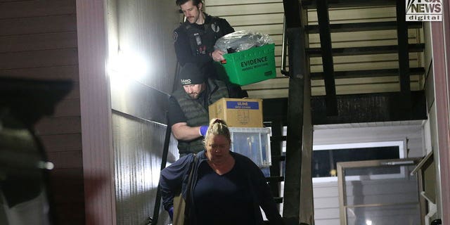 Investigators search Bryan Christopher Kohberger's home in Pullman, WA after dark on December 30, 2022.