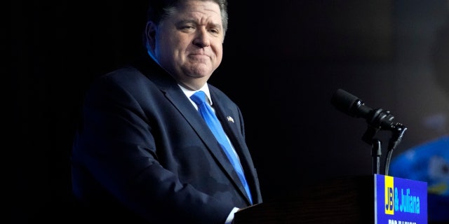 FILE - Illinois Gov. J.B. Pritzker looks to supporters after he defeated GOP challenger Darren Bailey on Nov. 8, 2022, in Chicago.