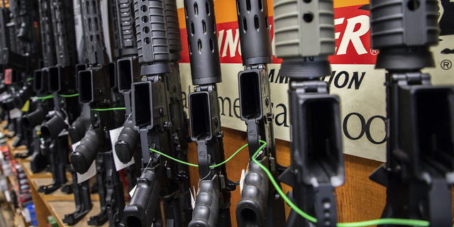 Several AR-15-style rifles are on display at Freddie Bear Sports gun shop in Tinley Park, Illinois, on Aug. 8, 2019.