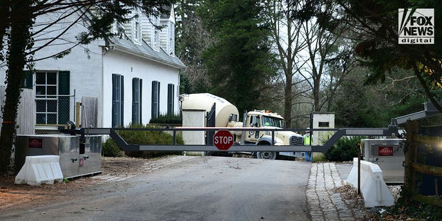 A general view of the gate to the driveway leading to President Joe Biden's home in Wilmington, Delaware, Thursday, January 12, 2023. 
