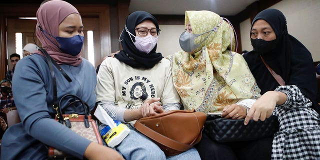 Mothers of acute kidney injury victims attend a hearing for a class-action lawsuit filed against the Indonesian government and drug companies in Jakarta, Indonesia, on Jan. 17, 2023.