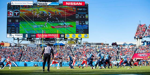 General view as Ryan Tannehill #17 hands the ball to Derrick Henry #22 of the Tennessee Titans during the second quarter against the Kansas City Chiefs at Nissan Stadium on Nov. 10, 2019 in Nashville, Tennessee. Tennessee defeats Kansas City 35-32.  