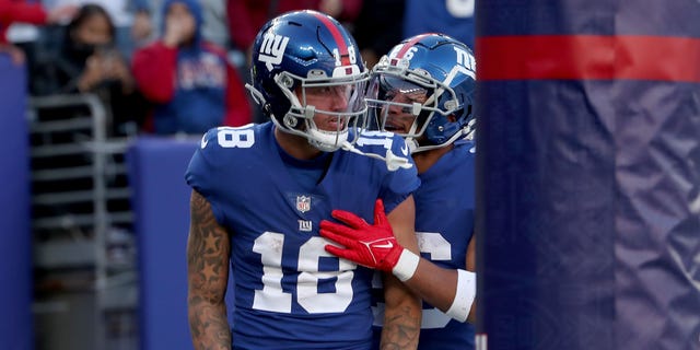 Isaiah Hodgins #18 of the New York Giants celebrates a touchdown against the Indianapolis Colts during the second quarter at MetLife Stadium on January 01, 2023 in East Rutherford, New Jersey.
