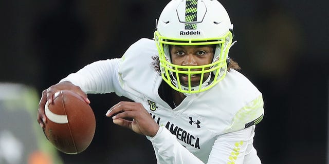 Quarterback Jaden Rashada runs with the ball during the Under Armour Next All-America Game at Camping World Stadium in Orlando, Florida, on Jan. 3, 2023.