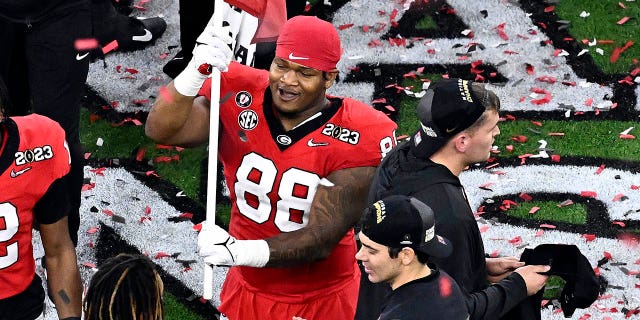 Jalen Carter #88 of the Georgia Bulldogs celebrates after defeating the TCU Horned Frogs in the college football national championship game at SoFi Stadium on January 9, 2023 in Inglewood, California.  Georgia defeated TCU 65-7.