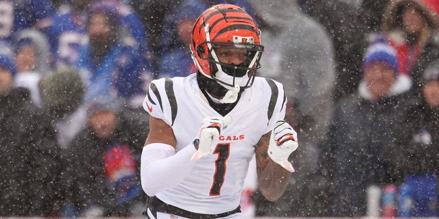Ja'Marr Chase of the Cincinnati Bengals celebrates after scoring a touchdown against the Buffalo Bills during the first quarter of the AFC Divisional Playoff game at Highmark Stadium on January 22, 2023 in Orchard Park, New York.