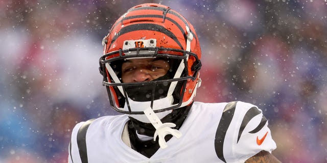 Ja'Marr Chase of the Cincinnati Bengals celebrates after scoring a touchdown against the Buffalo Bills during the first quarter in the AFC Divisional Playoff game at Highmark Stadium on Jan. 22, 2023, in Orchard Park, New York.