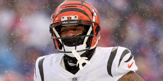 Ja'Marr Chase of the Cincinnati Bengals celebrates after scoring a touchdown against the Buffalo Bills during the first quarter in the AFC Divisional Playoff game at Highmark Stadium on Jan. 22, 2023, in Orchard Park, New York.