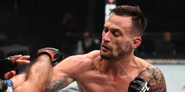 James Krause punches Claudio Silva of Brazil in their welterweight bout at the UFC Fight Night event at Flash Forum at UFC Fight Island on October 18, 2020 in Abu Dhabi, United Arab Emirates.