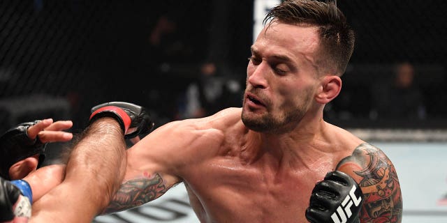 James Krause punches Claudio Silva of Brazil in their welterweight bout during the UFC Fight Night event inside Flash Forum at UFC Fight Island on October 18, 2020 in Abu Dhabi, United Arab Emirates.