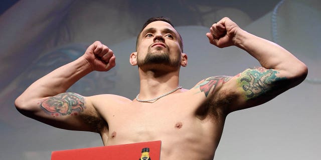 James Krause poses on the scale during the UFC 247 ceremonial weigh-in at the Toyota Center on February 7, 2020 in Houston, Texas.