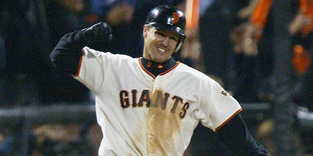 San Francisco Giant Jeff Kent pumps his fist after hitting a two-run home run against the Anaheim Angels in the sixth inning in Game Five in the World Series in San Francisco 24 October 2002.